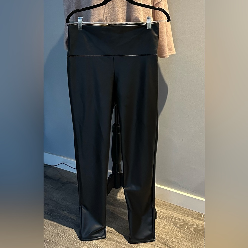 New! Faux, leather leggings with stretch.but size up 1 size